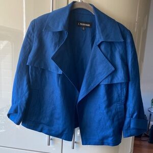 Short jacket with trench style details.